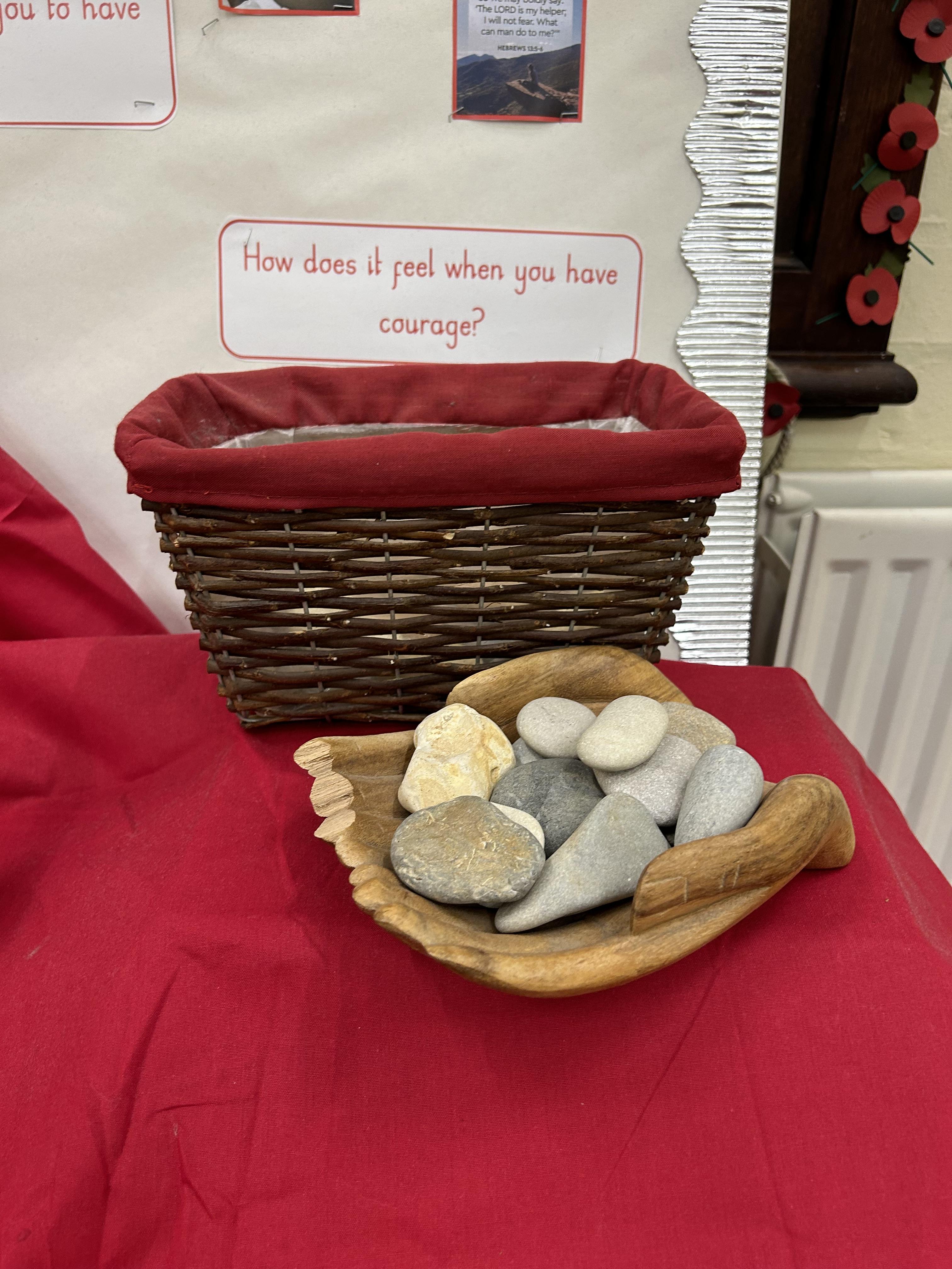 We held a pebble when we prayed  to God to help us to have courage.